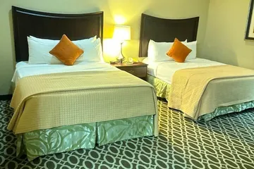 Sunday House Inn and Suites