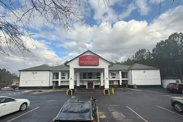 Magnolia Bay Hotel & Suites