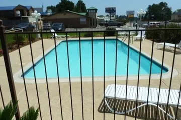Xecutive Inn and Suites